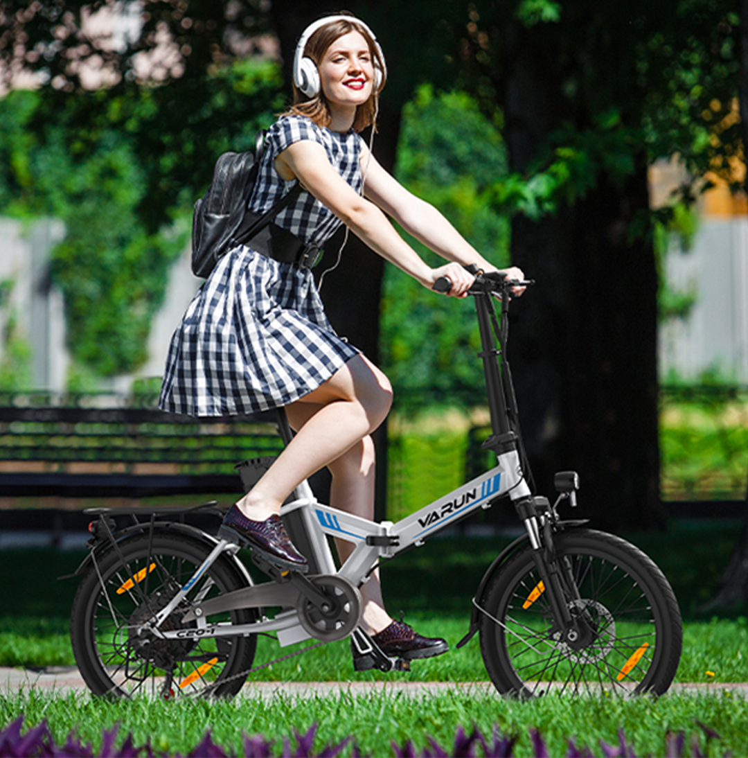 a-woman-enjoying-C20-1-riding-in-the-park